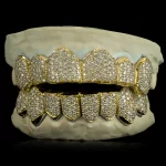 Pimp Your Teeth With The Dopest Silver And Gold Custom Grillz Online